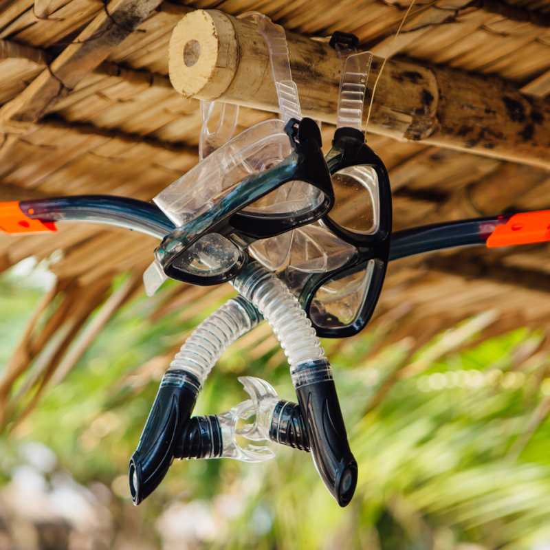 Snorkels And Goggles Hang On Beach Hut In Bali.
