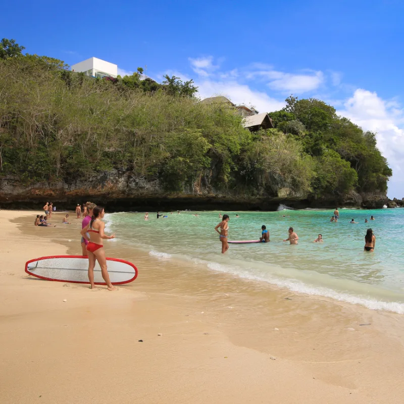 Tourists-Play-On-Padang-Padang-beach-in-Bali