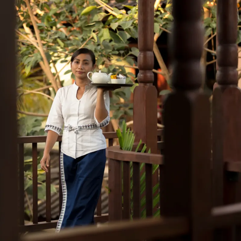 Waitress In Bali Restaurant Cafe Serve Coffee.jpg