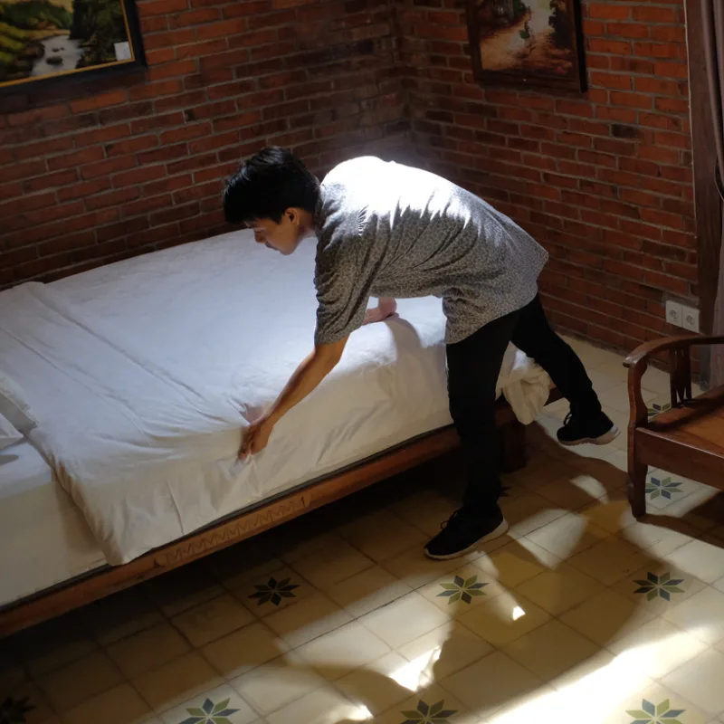 Bali Tourism Worker Hospitality Staff Housekeeping Hotel Room.