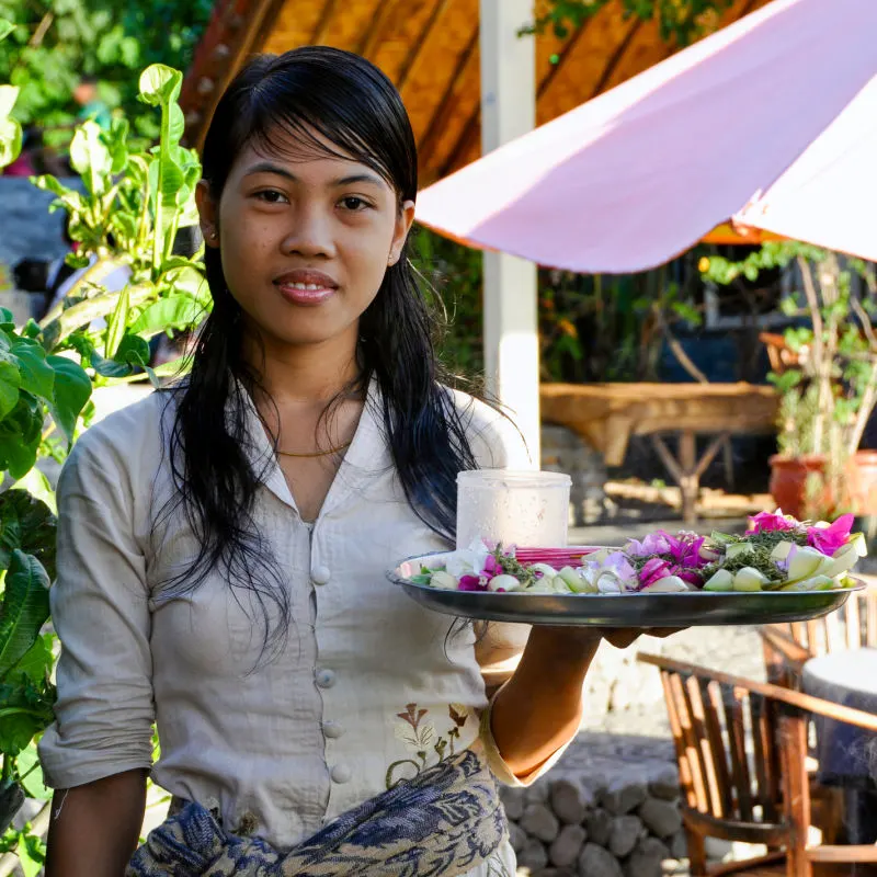 Bali Waitress With Tray For Puja Blessings