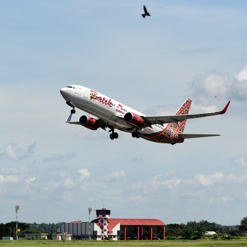 Batik Air Plane Flies Over Airport.