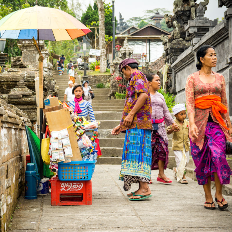 Community In Bali Go About Their Daily Life