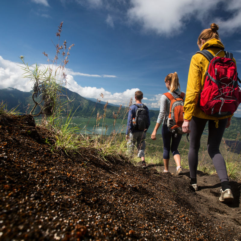 Hikers Tourists Walk Down Mountain In Bali An Example Of Adventure Tourism