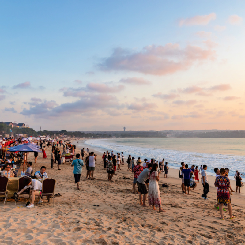 Jimbaran Beach Busy With Tourists At Sunset