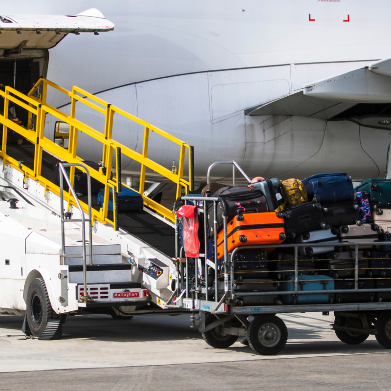 Luggage Loading Onto Airline At Airport