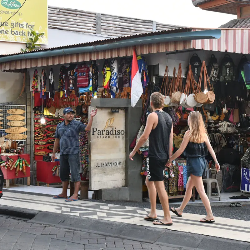 Tourists Walk Down Street in Legian Kuta Bali