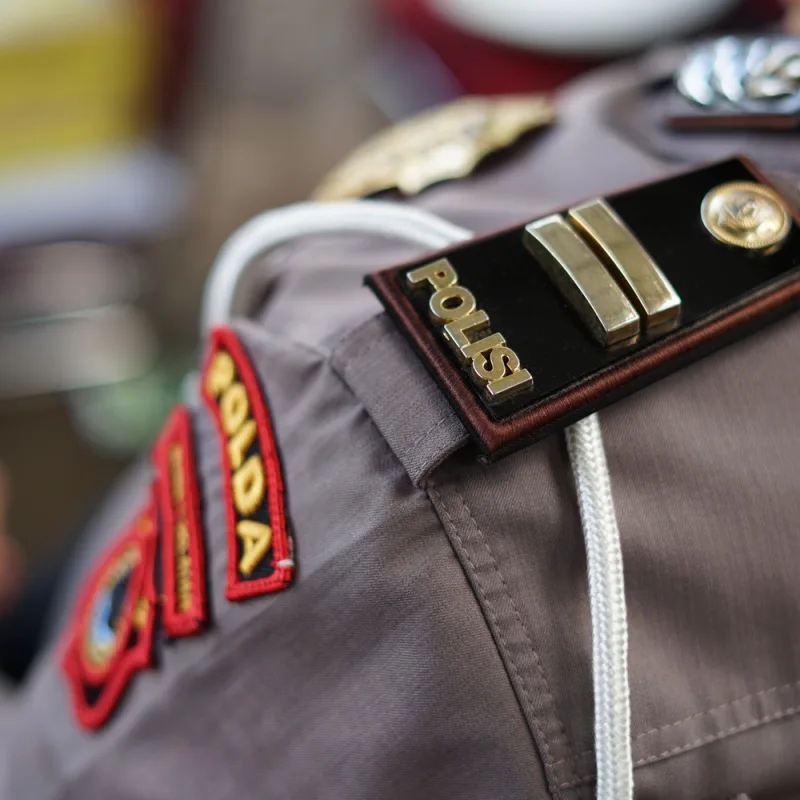 Close-Up-Of-Police-Uniform