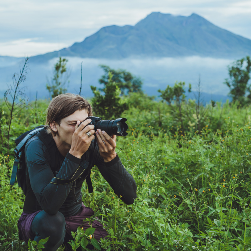 Photographer In Bali Mountain Highlands Takes Photo