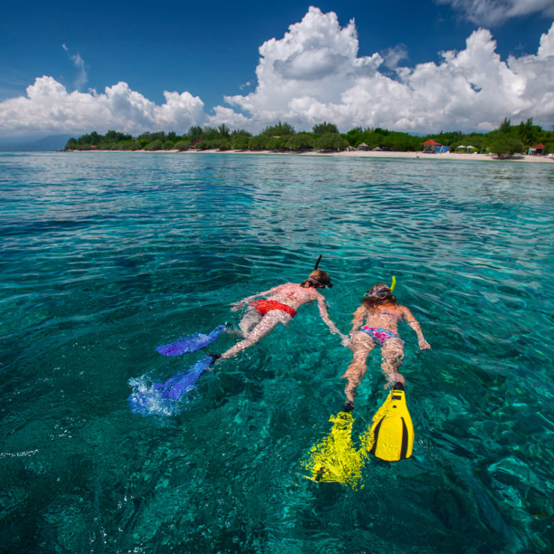 Two-People-Snorkel-Off-Waters-in-Bali