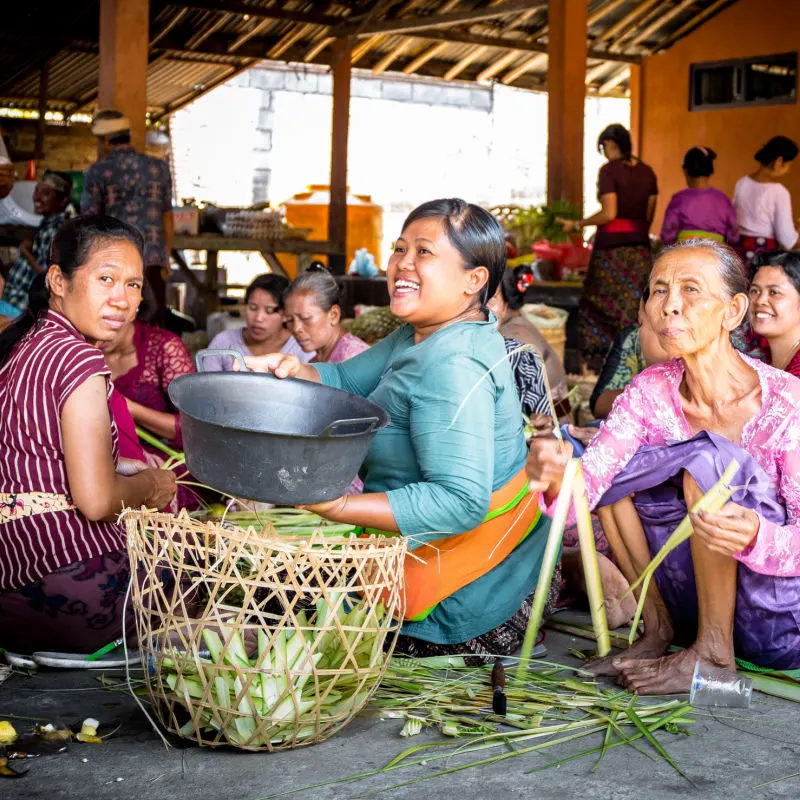 Women in Bali Prepare for Ceremony at Temple