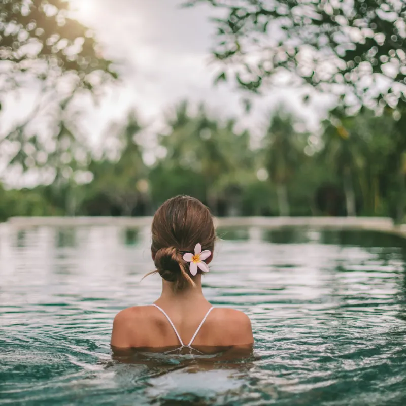 Woman in Infinity Pool in Jungle in Bali.jpg