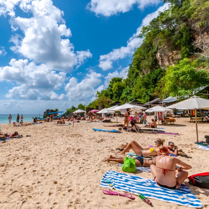 Tourists-on-Padang-Padang-Beach-in-Uluwatu-Bali