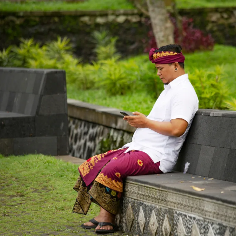 Balinese-Man-On-His-Phone