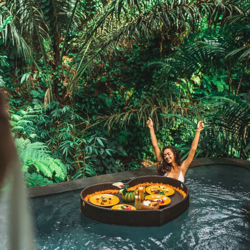 Woman-In-Luxury-Swimming-Pool-Ubud-Hotel