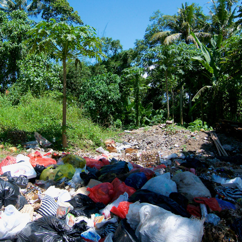 illegal landfill in Bali waste trash pile pollution 
