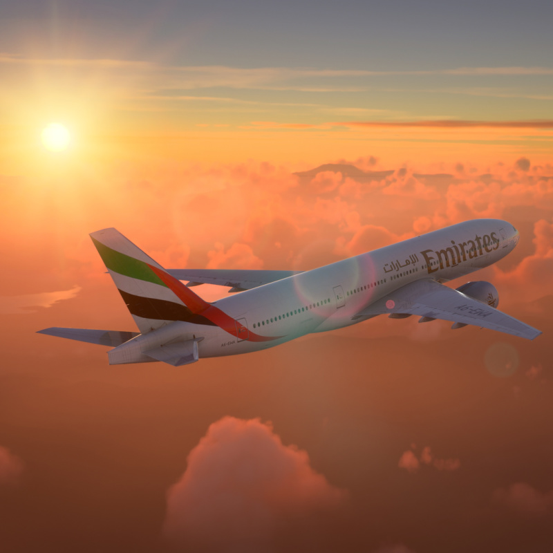 Emirates Plane At Sunset.jpg