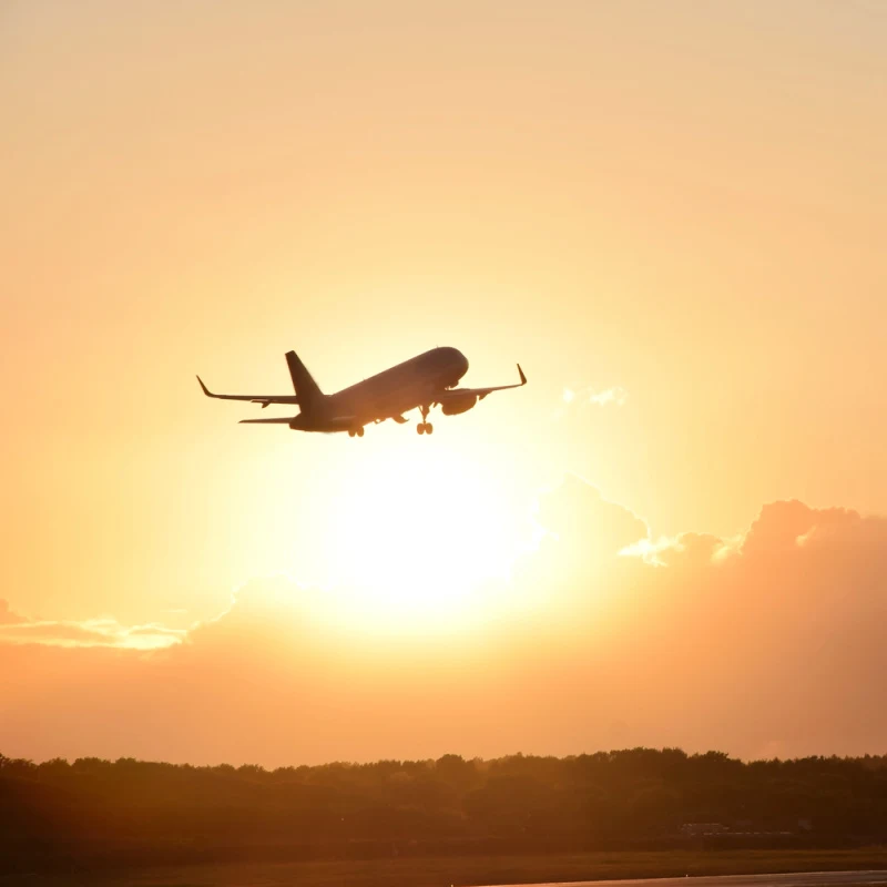 Plane-takes-off-into-the-sunset