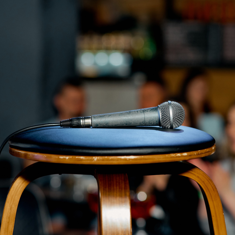 Mic on stool at music comedy event.jpg