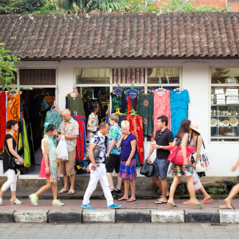 Tourists-Walk-Along-Street-in-Ubud