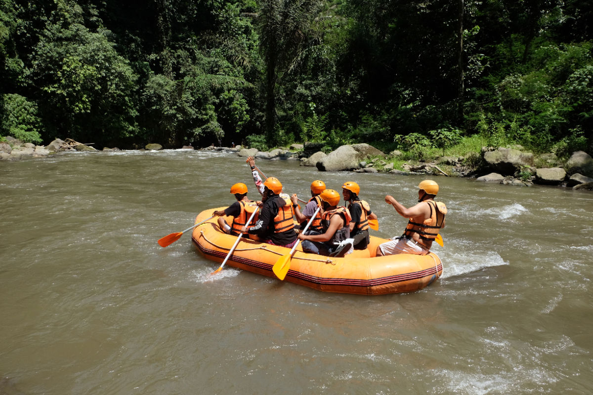 Tourists Go White Water Rafting On River In Bali.jpg