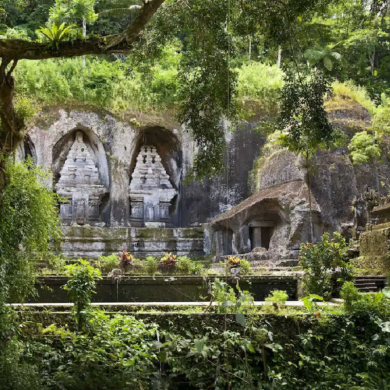 Gunung Kawi Temple. Gunug Kawi is an ancient temple situated in Pakerisan River, near Tampaksiring village in Bali. The archaeological complex is carved out of the living rock, dating to 11th century.