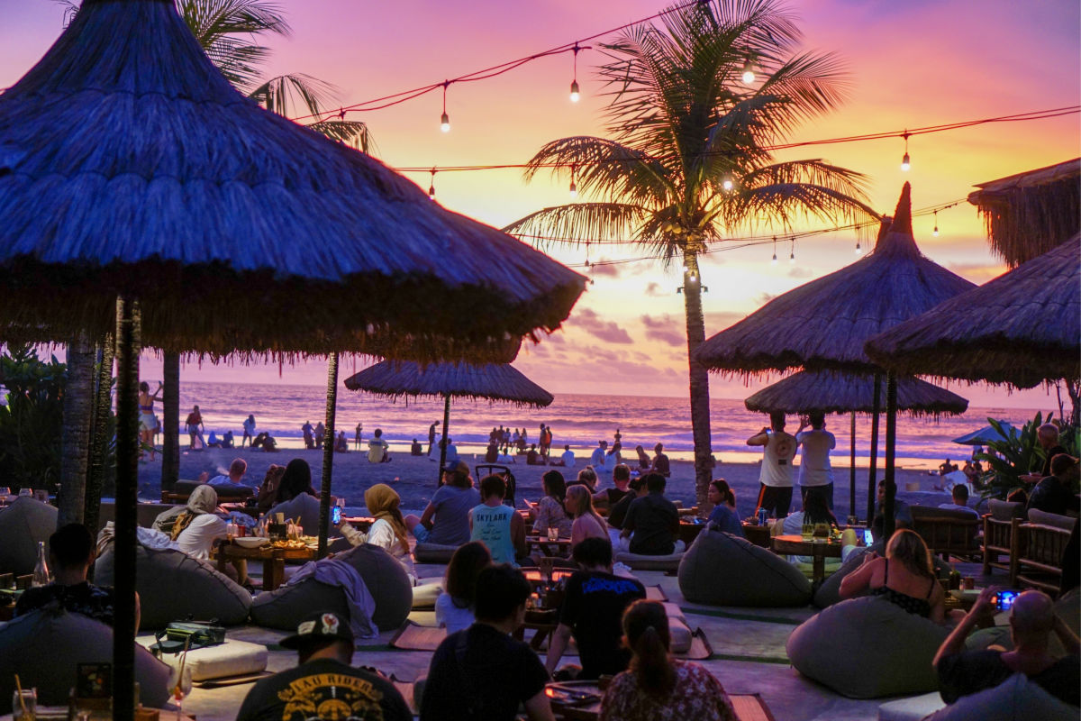 Tourists at Beach Club in Seminyak Bali at Sunset.jpg