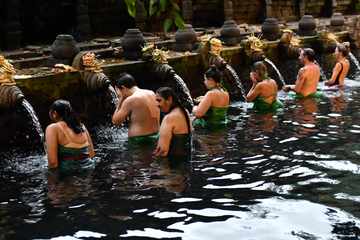 Worshippers at Tirta Empul Temple in Bali