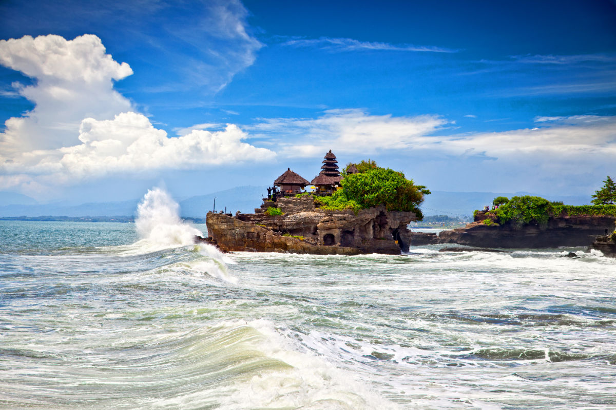Tanah Lot Temple in Bali at High Tide.jpg