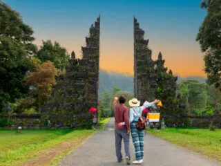 Tourists Stand at Temple Gates in Bali.jpg