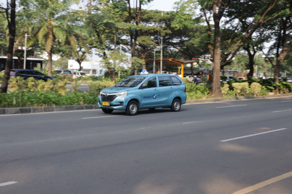 Blue Bird Taxi On Bali Road.jpg