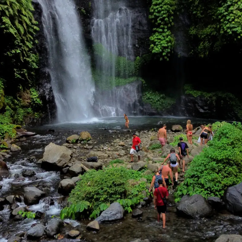 Tourists-explore-Sekumpul-Waterfall-in-North-Bali-Buleleng