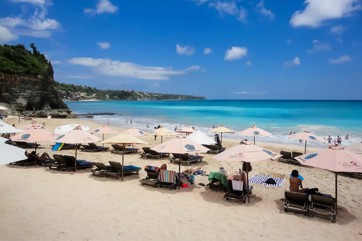 Dreamland Beach in Bali Sun Loungers and Umbrellas.jpg