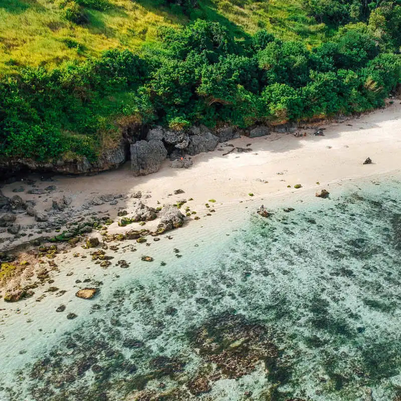 Birds-Eye-View-of-Gunung-Payung-Beach-in-Bali