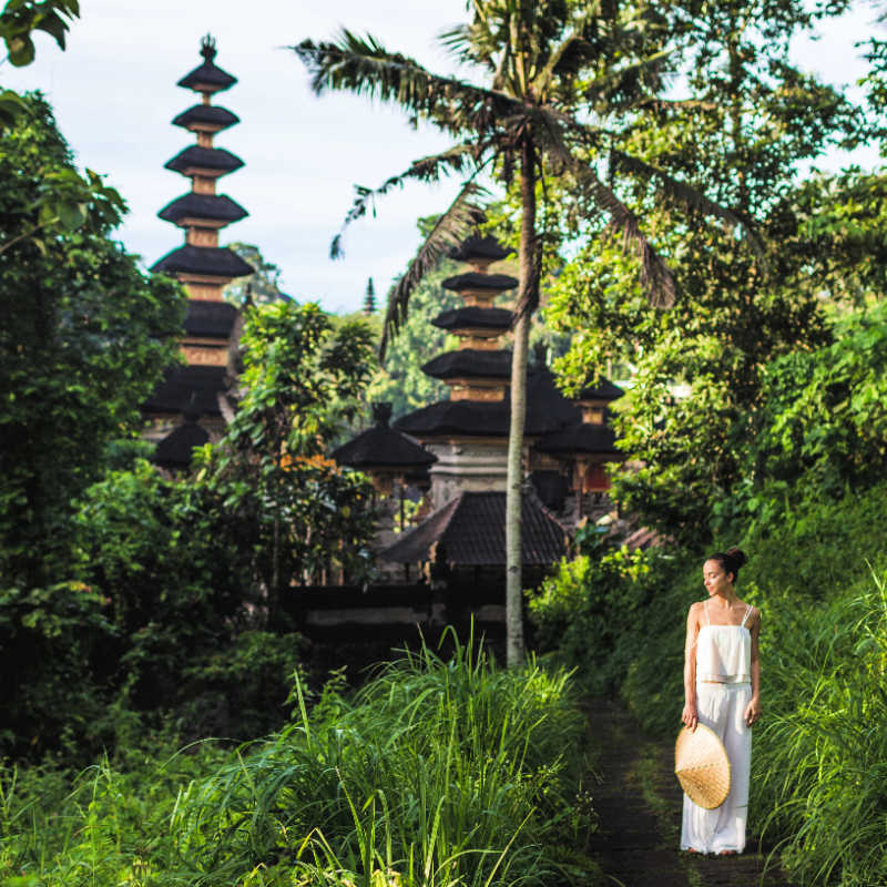 Woman-in-front-of-Ubud-Temple-in-Bali-and-Jungle