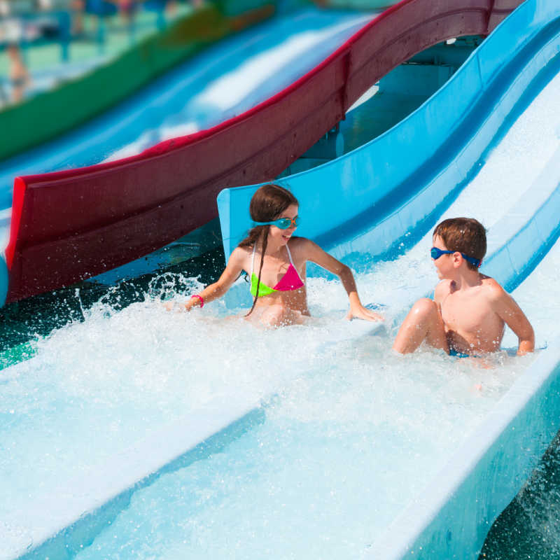 Kids-on-Water-Slide-At-Water-Theme-Park-in-Bali