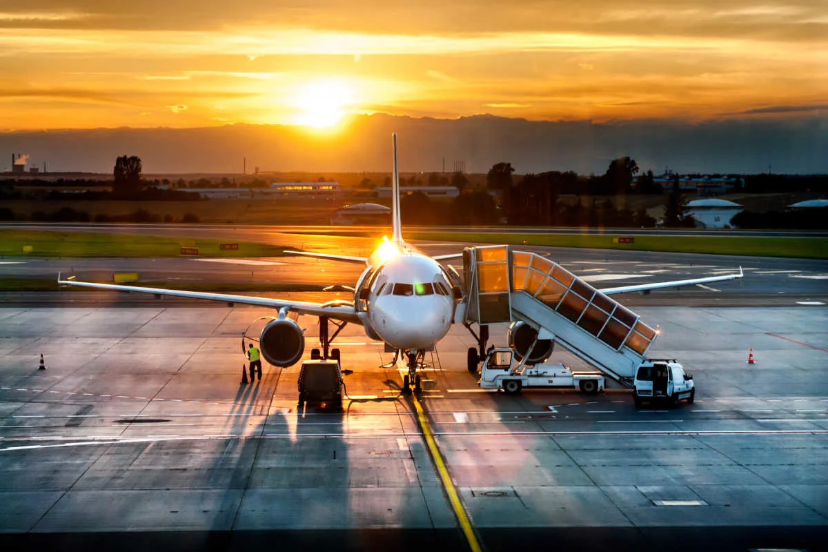 Airport Runway and Plane at Sunset.jpg