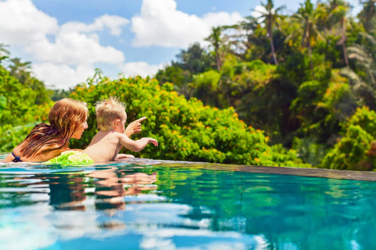 Mother and Son in Pool in Ubud Hotel