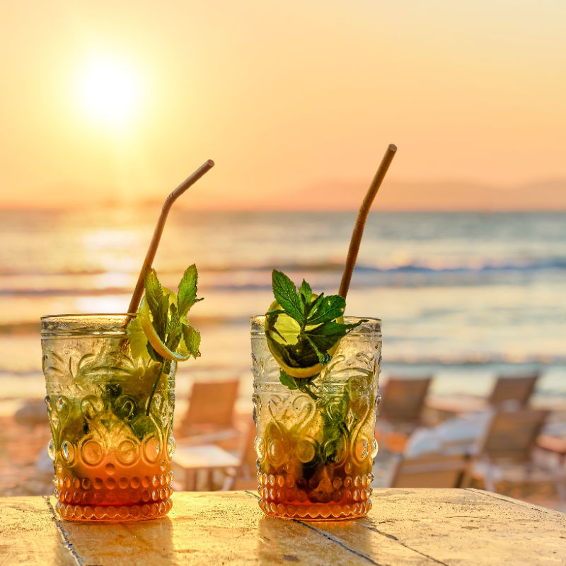 Cocktails-At-Sunset-On-Beach-in-Bali