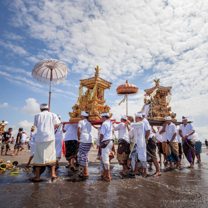 Local-Community-Perform-Melasti-Ceremony-on-Beach-in-Bali-Before-Nyepi