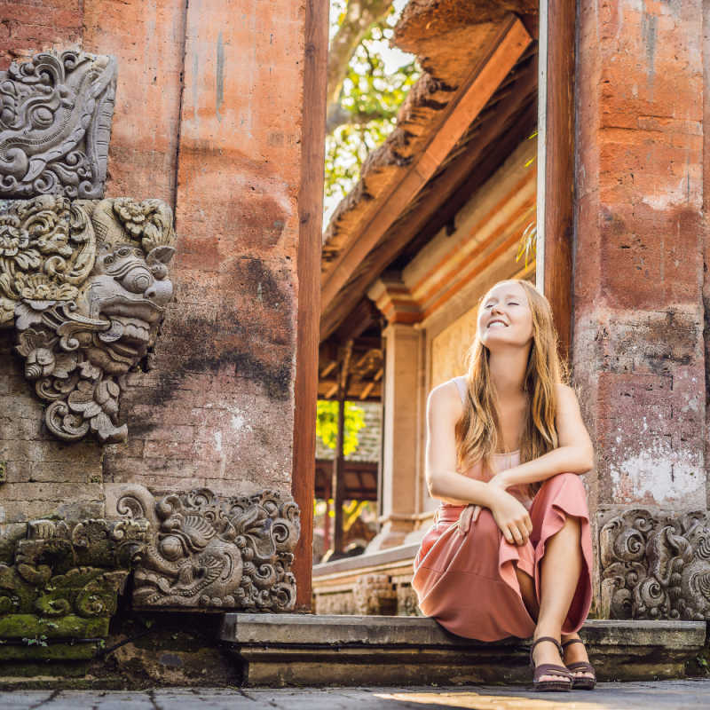 Woman-Tourist-Sits-On-Step-in-Ubud-Bali