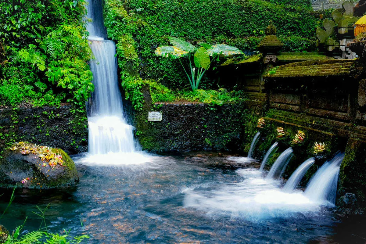 Waterfall and water temple in Bali.jpg