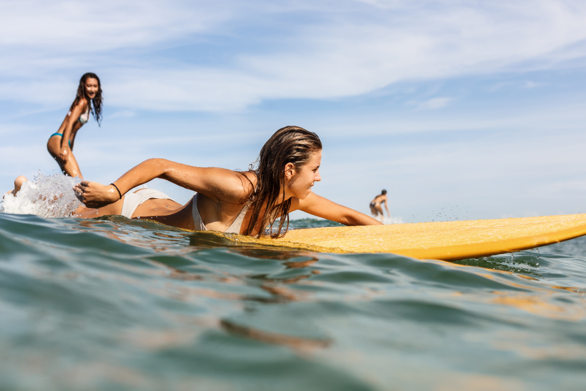 Women Surfers Paddle Out.jpg