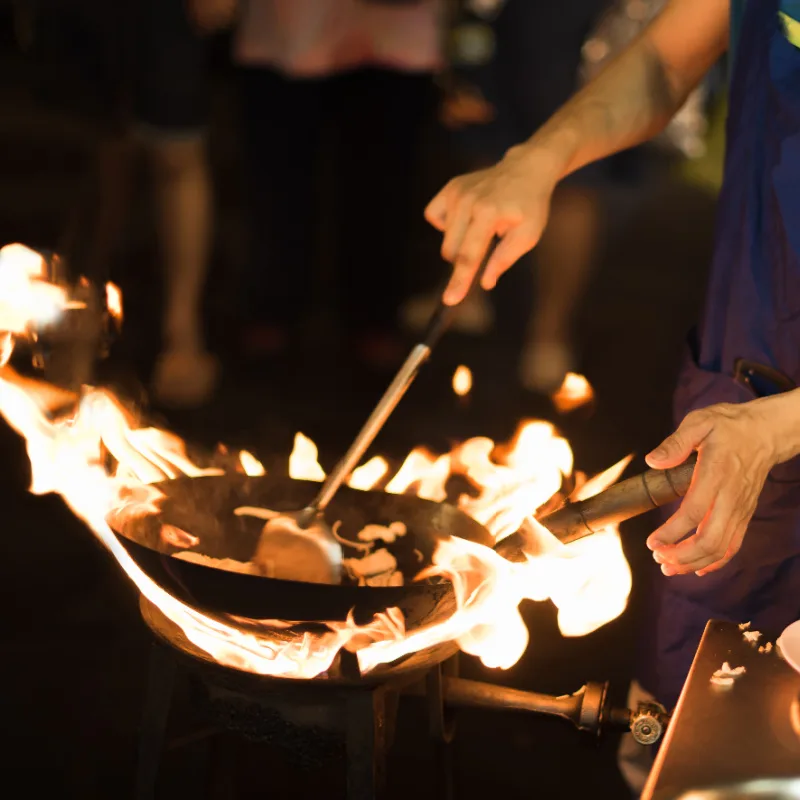 Chef-Cooks-Fried-Food-In-Bali