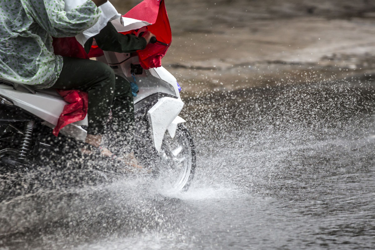 Motorcycle Drives in Bad Weather Rain Storm Flood.jpg