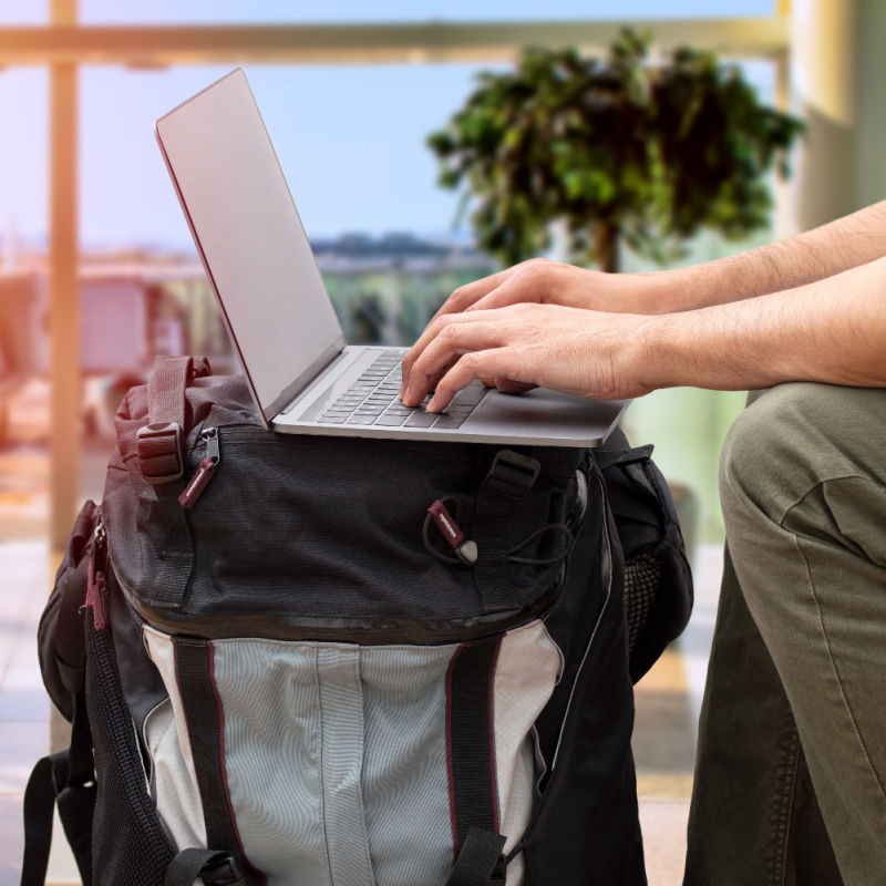 Laptop-on-Backpack-at-Airport