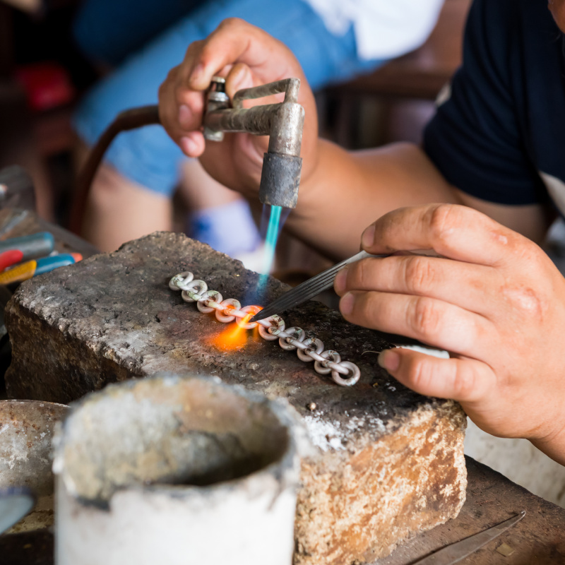 Silversmith-working-on-silver