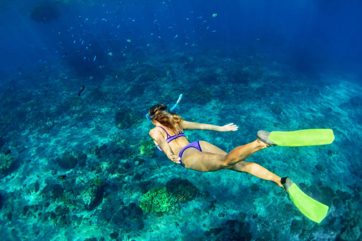 Woman Snorkels In Nusa Penida Bali.jpg