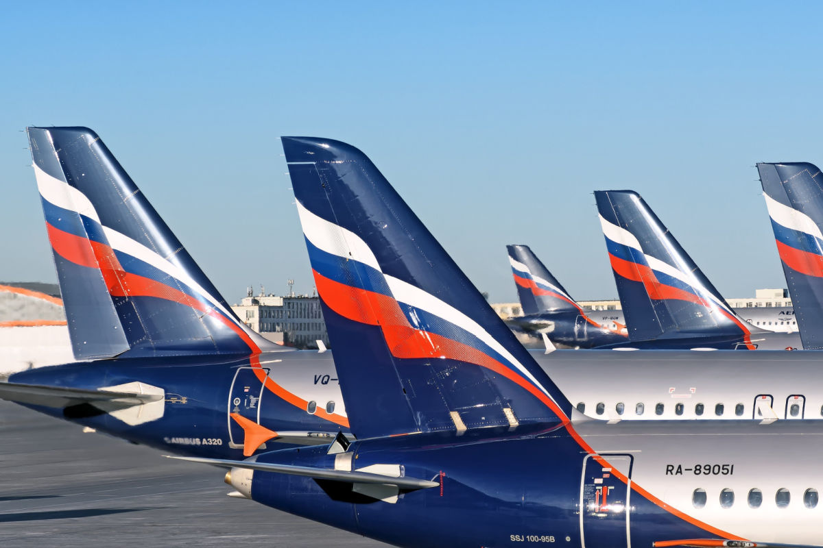 Russian Commerical Airplanes Lined Up at Airport.jpg
