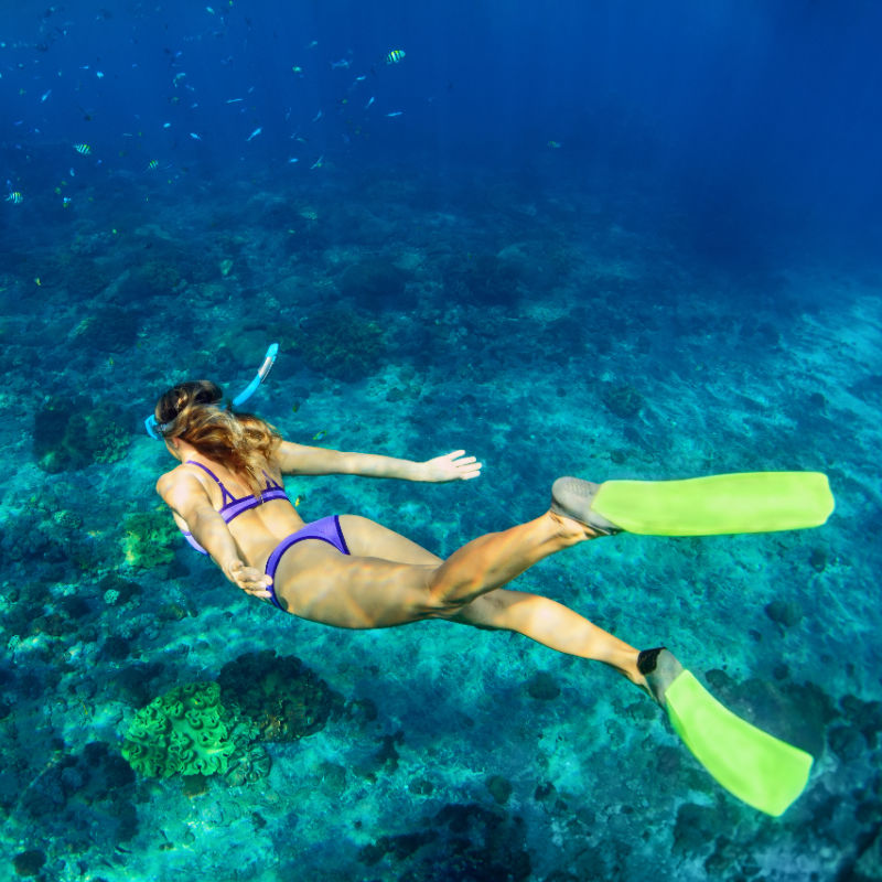 Woman Snorkels In Nusa Penida Bali.jpg